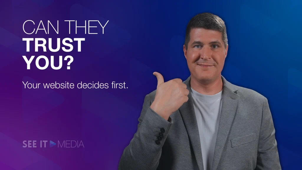 Image for the blog post: The Trust Gap: Why Website Trust Signals Matter Most. Features a man in a gray blazer giving a thumbs‑up beside bold text that reads: Can they trust you.